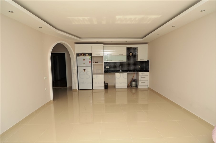 شقة بتخطيط 1+1 في منطقة توسمور – ألانيا