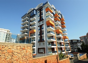 شقة بتخطيط 1+1 في منطقة توسمور – ألانيا