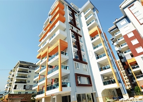 شقة بتخطيط 1+1 في منطقة توسمور – ألانيا