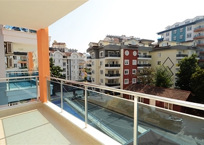 شقة بتخطيط 1+1 في منطقة توسمور – ألانيا