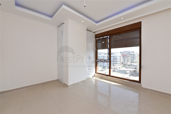 شقق ضمن مجمع سكني حديث على مقربة من البحر قيد الإنشاء في منطقة كاستل – ألانيا