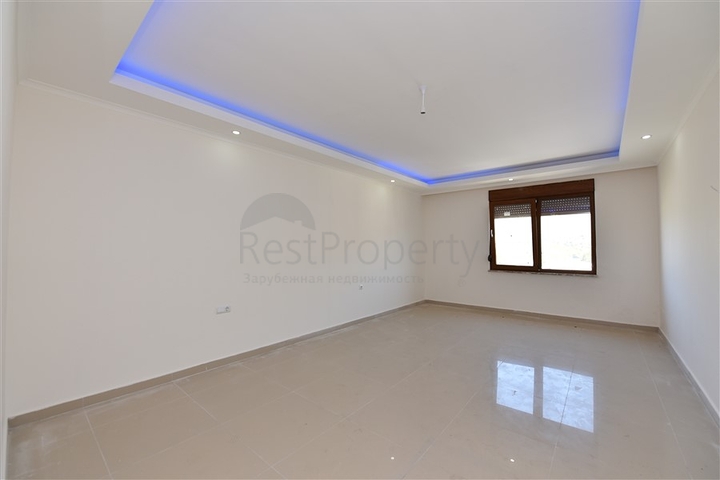 شقق ضمن مجمع سكني حديث على مقربة من البحر قيد الإنشاء في منطقة كاستل – ألانيا