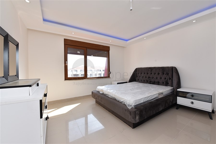 شقق ضمن مجمع سكني حديث على مقربة من البحر قيد الإنشاء في منطقة كاستل – ألانيا