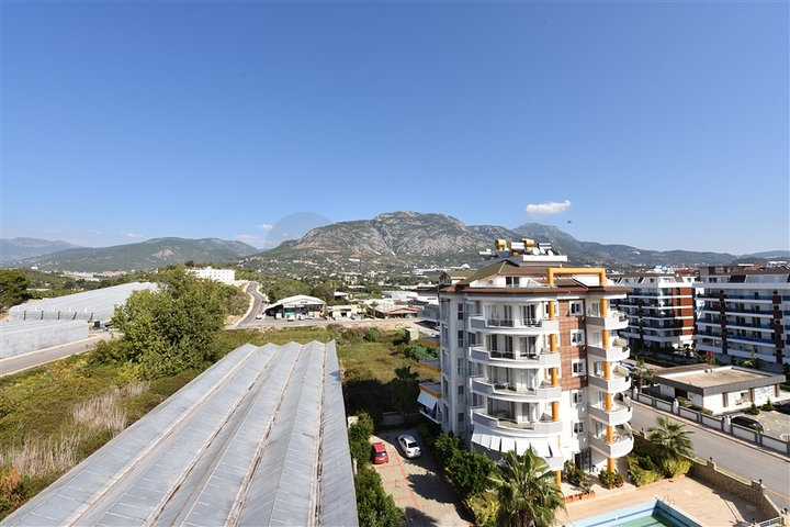 شقق ضمن مجمع سكني حديث على مقربة من البحر قيد الإنشاء في منطقة كاستل – ألانيا