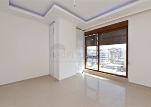 شقق ضمن مجمع سكني حديث على مقربة من البحر قيد الإنشاء في منطقة كاستل – ألانيا