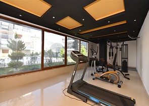 شقق ضمن مجمع سكني حديث على مقربة من البحر قيد الإنشاء في منطقة كاستل – ألانيا