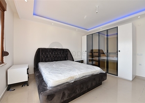 شقق ضمن مجمع سكني حديث على مقربة من البحر قيد الإنشاء في منطقة كاستل – ألانيا