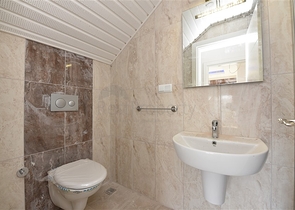 شقق ضمن مجمع سكني حديث على مقربة من البحر قيد الإنشاء في منطقة كاستل – ألانيا