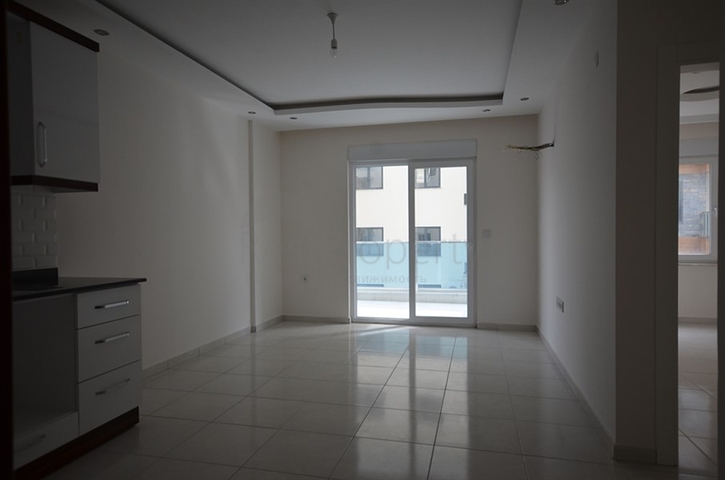 شقة جديدة على بعد 50 متر عن شاطئ البحر في منطقة محمودلار – ألانيا