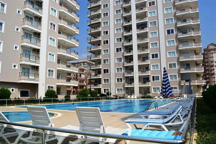 شقة مؤثثة على شاطئ البحر في منطقة محمودلار – ألانيا