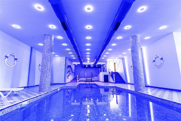 شقة بتخطيط 2+1 ضمن مجمع حديث في منطقة محمودلار – ألانيا