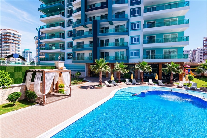 شقة بتخطيط 2+1 ضمن مجمع حديث في منطقة محمودلار – ألانيا