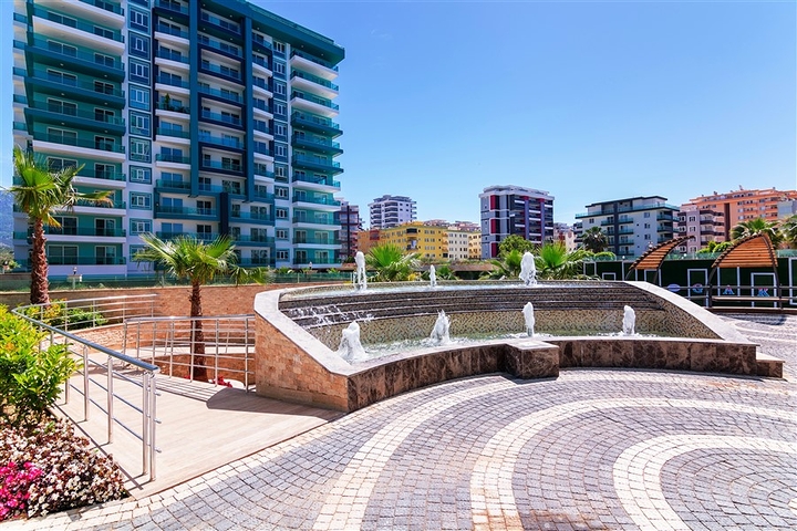 شقة بتخطيط 2+1 ضمن مجمع حديث في منطقة محمودلار – ألانيا