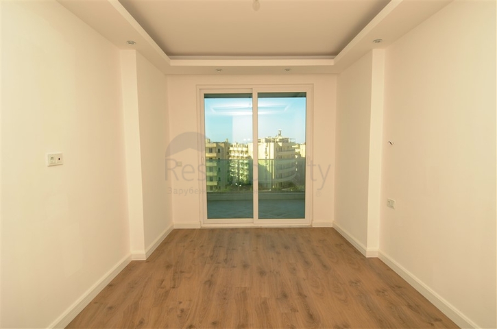 شقة بتخطيط 2+1 ضمن مجمع حديث في منطقة محمودلار – ألانيا