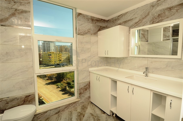 شقة بتخطيط 2+1 ضمن مجمع حديث في منطقة محمودلار – ألانيا