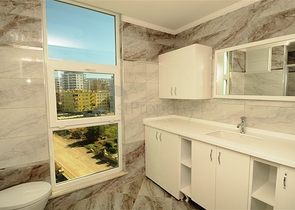 شقة بتخطيط 2+1 ضمن مجمع حديث في منطقة محمودلار – ألانيا