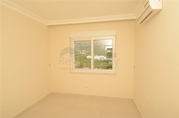 شقة بتخطيط 2+1 بمساحة واسعة في منطقة محمودلار – ألانيا