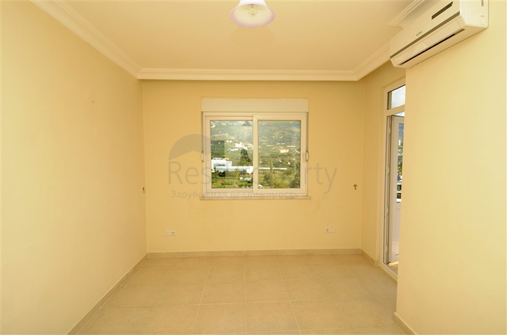 شقة بتخطيط 2+1 بمساحة واسعة في منطقة محمودلار – ألانيا