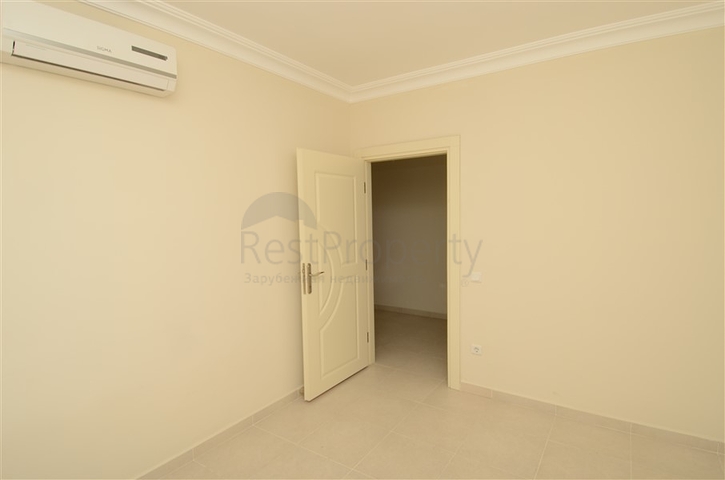 شقة بتخطيط 2+1 بمساحة واسعة في منطقة محمودلار – ألانيا