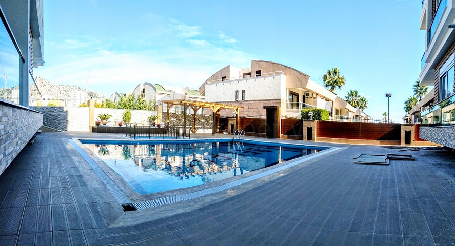 مشروع إستثماري قيد الإنشاء بالأقساط دون فوائد  في منطقة كونيالتي – أنطاليا