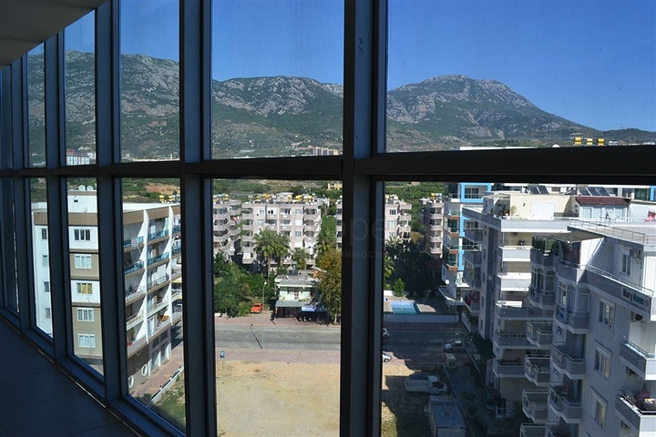 شقة بتخطيط 1+1 في وسط محمودلار – ألانيا