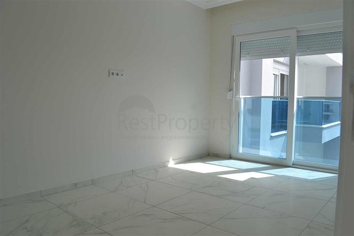 شقة بتخطيط 1+1 في وسط محمودلار – ألانيا