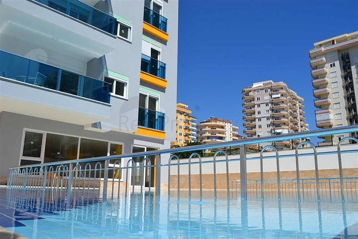 شقة بتخطيط 1+1 في وسط محمودلار – ألانيا