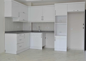 شقة بتخطيط 1+1 في وسط محمودلار – ألانيا