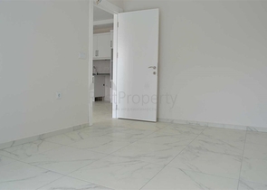 شقة بتخطيط 1+1 في وسط محمودلار – ألانيا