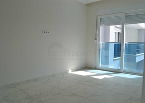 شقة بتخطيط 1+1 في وسط محمودلار – ألانيا