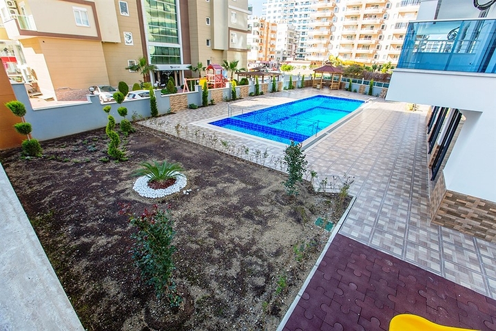 شقق ضمن مجمع سكني في منطقة محمودلار – ألانيا