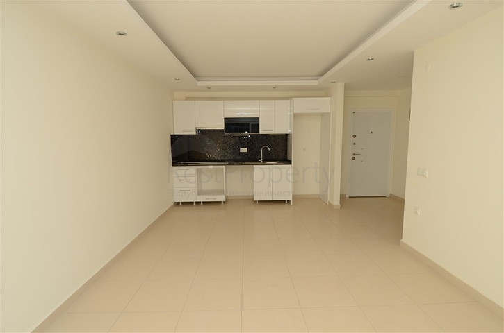 شقة بتخطيط 1+1 ضمن مجمع حديث في منطقة أوبا – ألانيا