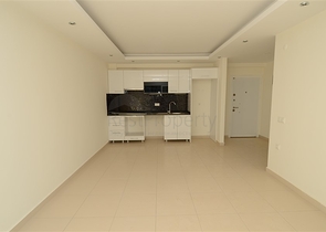 شقة بتخطيط 1+1 ضمن مجمع حديث في منطقة أوبا – ألانيا