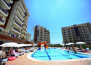 شقة بتخطيط 2+1 ضمن مجمع سكني شهير في منطقة أفسلار – ألانيا