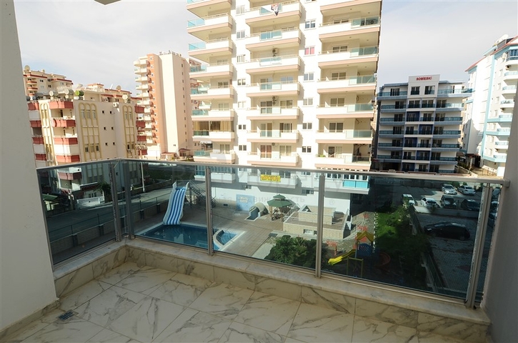 شقة بسعر مناسب ضمن مجمع جديد في منطقة محمودلار -ألانيا