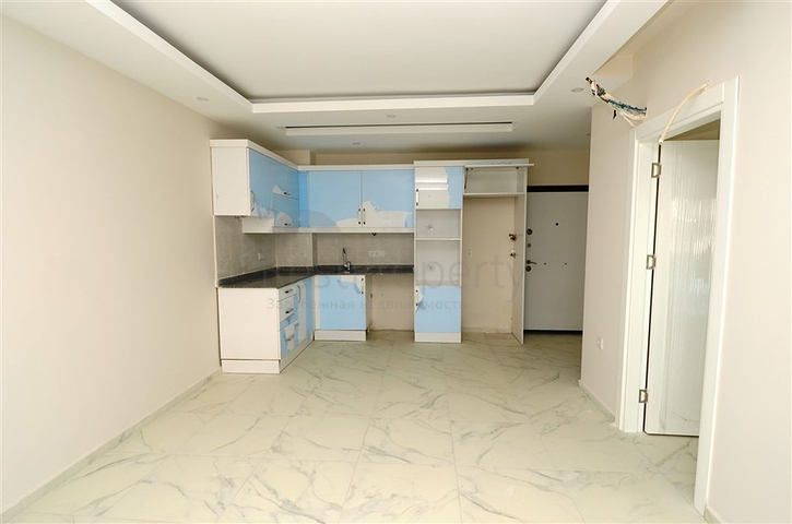 شقة بسعر مناسب ضمن مجمع جديد في منطقة محمودلار -ألانيا