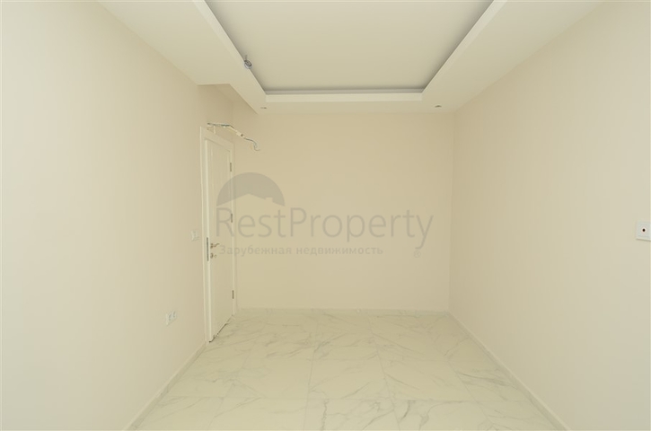 شقة بسعر مناسب ضمن مجمع جديد في منطقة محمودلار -ألانيا