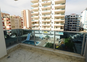 شقة بسعر مناسب ضمن مجمع جديد في منطقة محمودلار -ألانيا