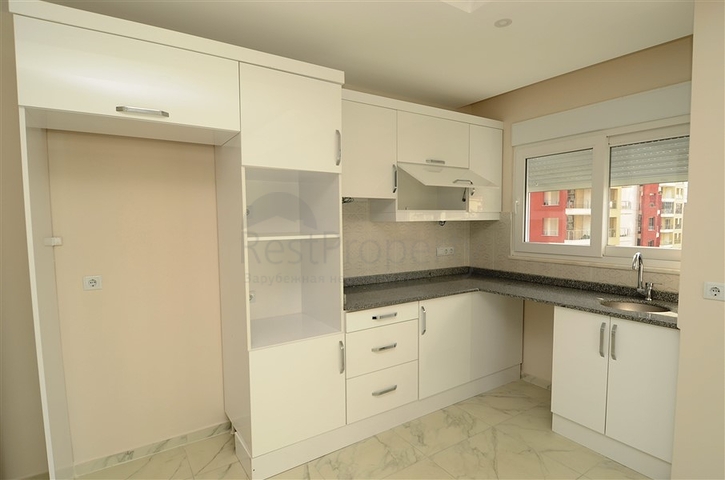 شقة بتخطيط 2+1 ضمن مجمع حديث في منطقة محمودلار – ألانيا