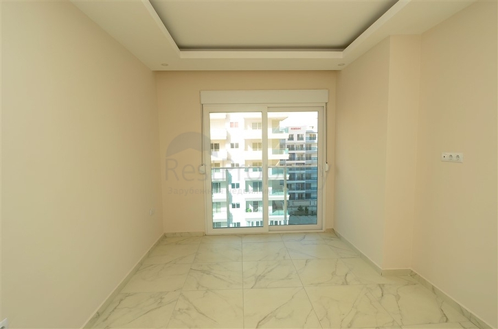 شقة بتخطيط 2+1 ضمن مجمع حديث في منطقة محمودلار – ألانيا