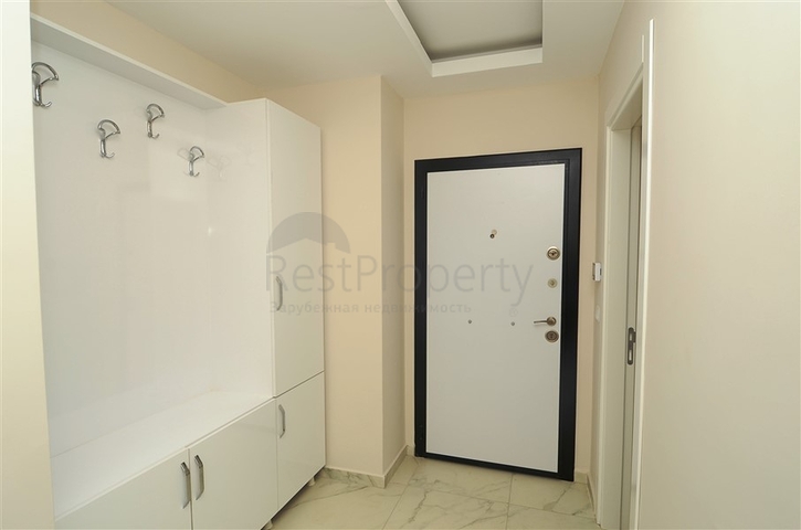 شقة بتخطيط 2+1 ضمن مجمع حديث في منطقة محمودلار – ألانيا