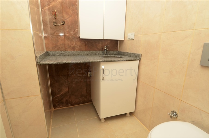 شقة بتخطيط 2+1 ضمن مجمع حديث في منطقة محمودلار – ألانيا