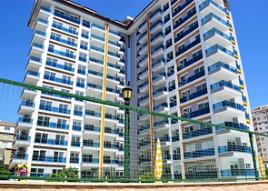 شقة بتخطيط 2+1 ضمن مجمع حديث في منطقة محمودلار – ألانيا