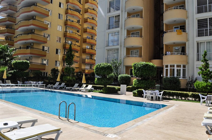 دوبلكس مؤثثة بإطلالة بحرية في منطقة محمودلار – ألانيا