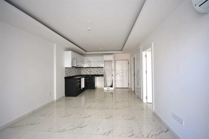 شقة بتخطيط 1+1 ضمن مجمع مميز في منطقة محمودلار – ألانيا