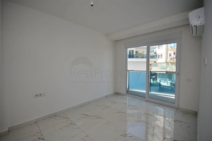 شقة بتخطيط 1+1 ضمن مجمع مميز في منطقة محمودلار – ألانيا