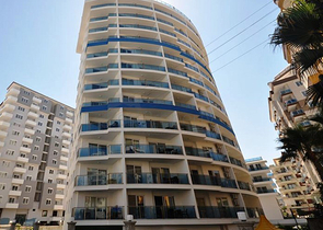 شقة بتخطيط 1+1 ضمن مجمع مميز في منطقة محمودلار – ألانيا