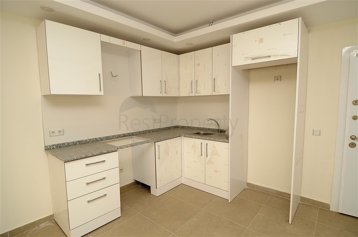 شقة بتخطيط 1+1 في مركز ألانيا