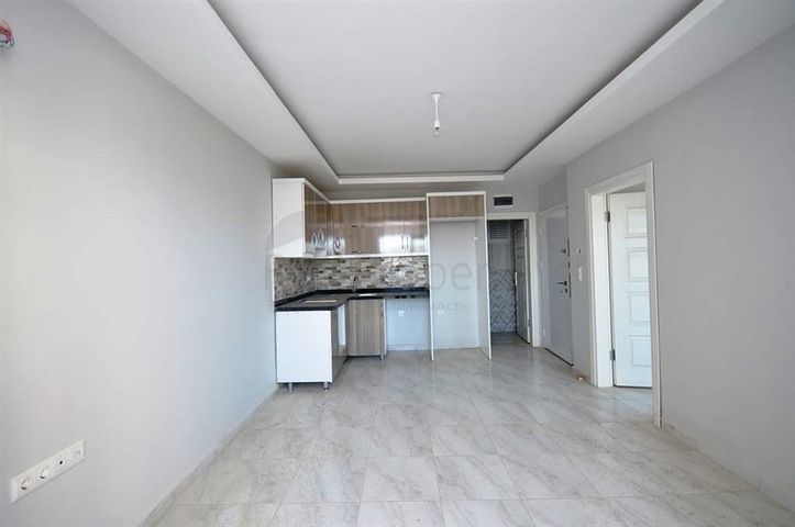 شقة بتخطيط 1+1 في منطقة محمودلار – ألانيا