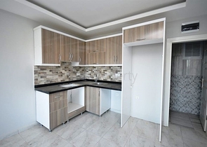 شقة بتخطيط 1+1 في منطقة محمودلار – ألانيا